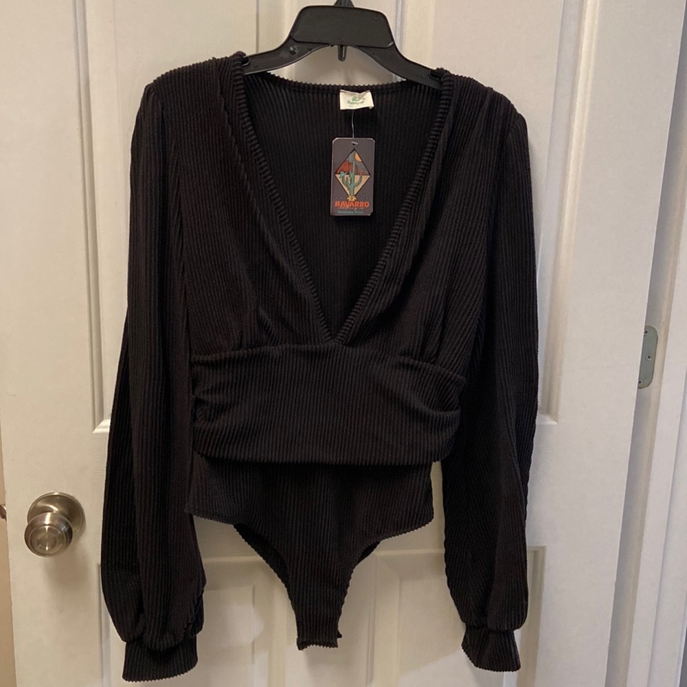 NWT- low V-neck bodysuit.